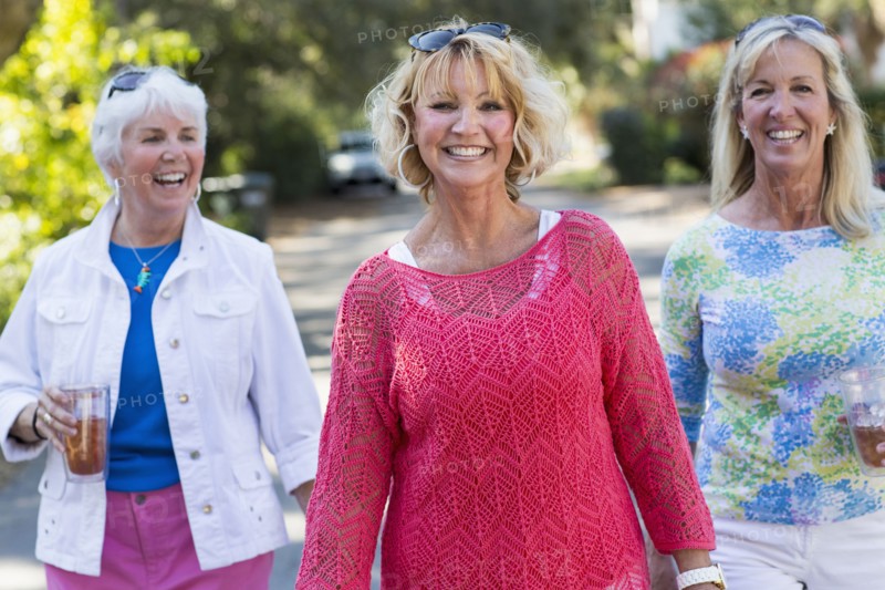 Caucasian women walking on suburban street