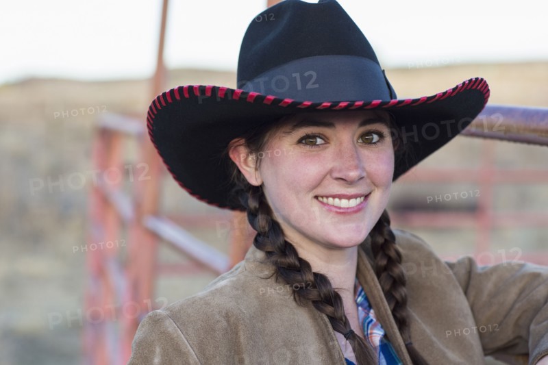 Caucasian girl smiling on farm