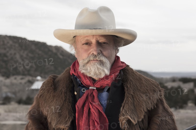 Caucasian man standing in dusty landscape