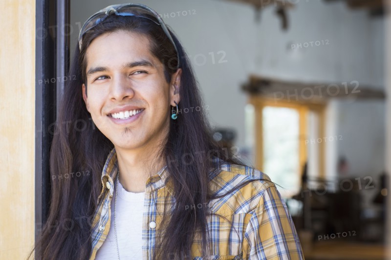 Mixed race man smiling
