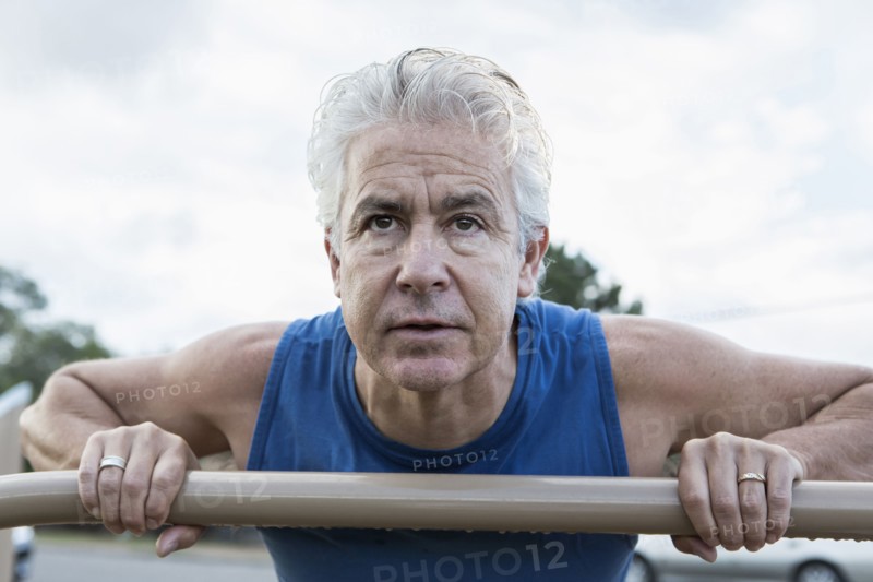 Hispanic man exercising outdoors