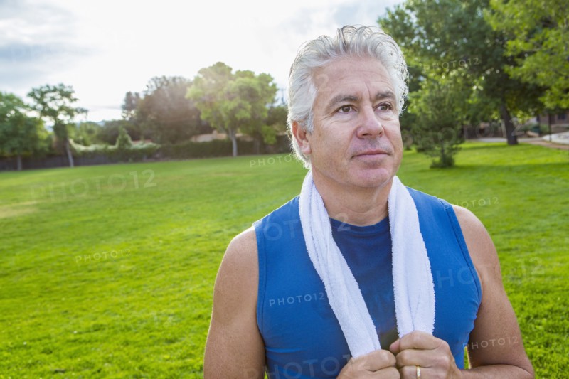 Hispanic man standing in park