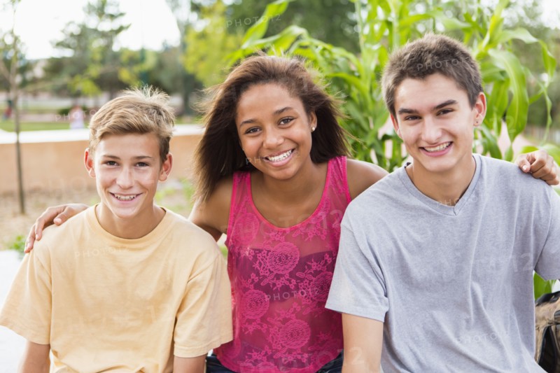 Teenagers smiling together outdoors