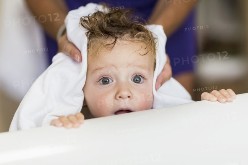 Mother drying hair  of baby son