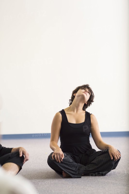 Student stretching in acting class