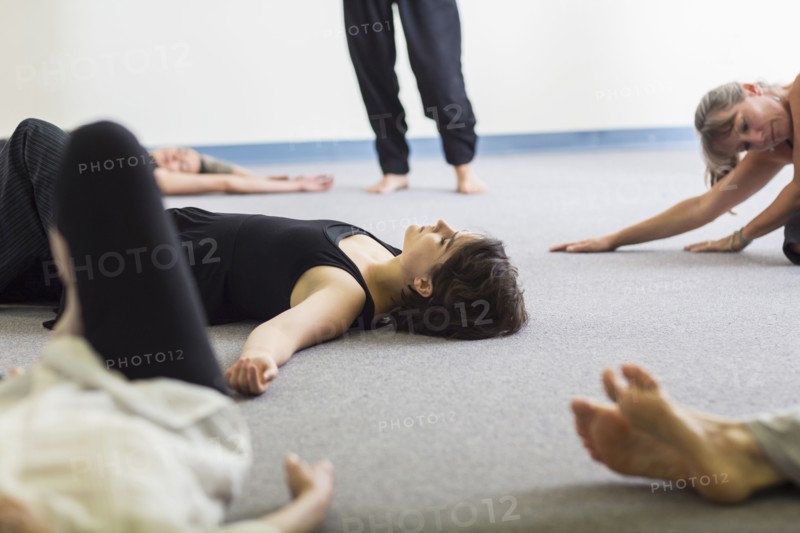 Students stretching in acting class