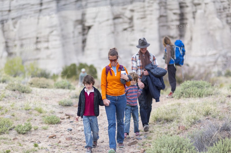 Family hiking on dirt path