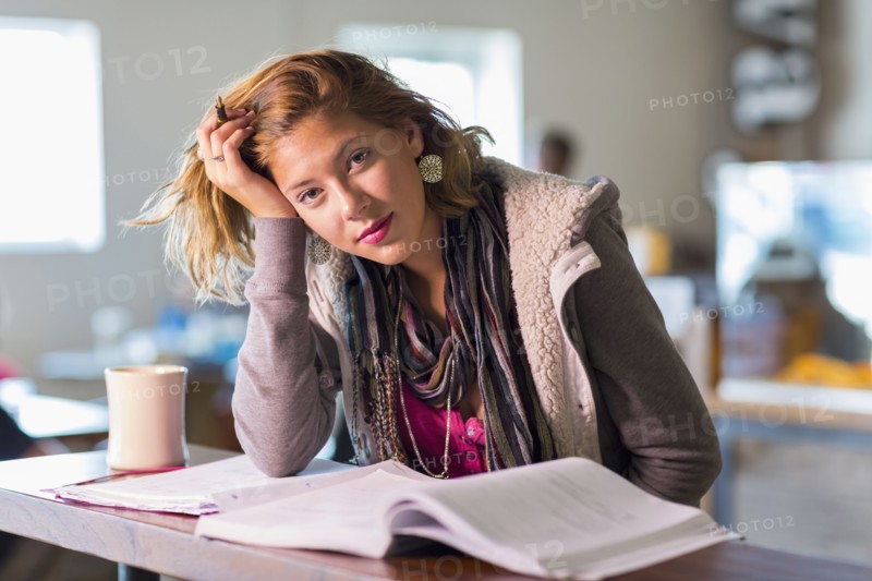 Mixed race student studying at table