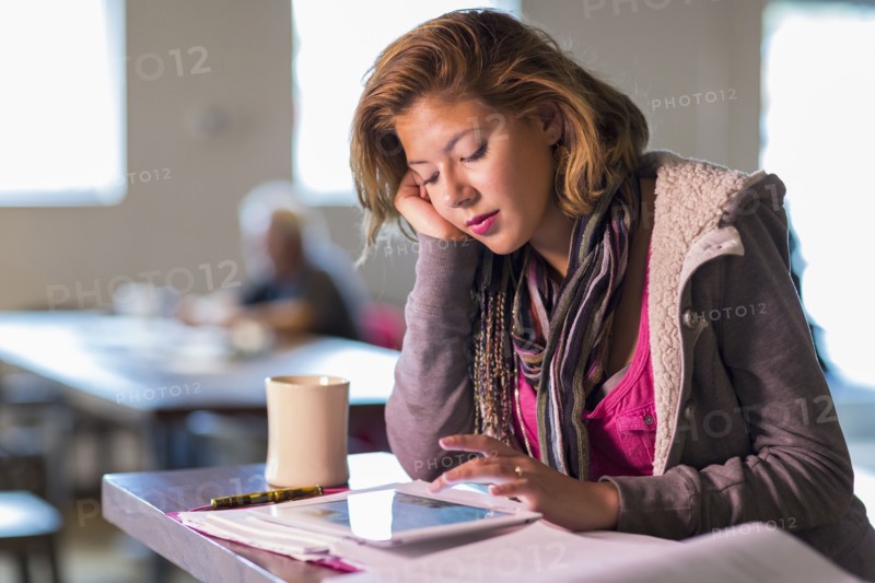 Mixed race student studying at table