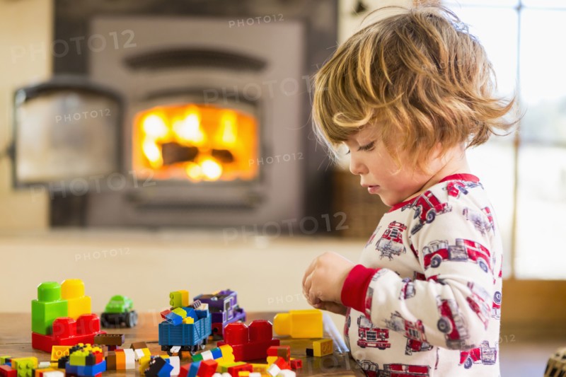 Caucasian boy playing with blocks