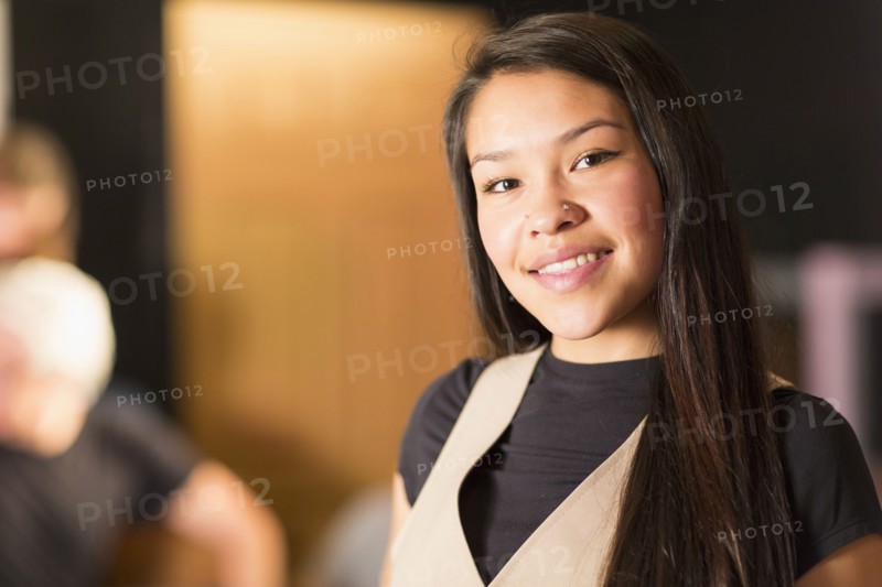 Portrait of smiling Mixed Race teenage girl