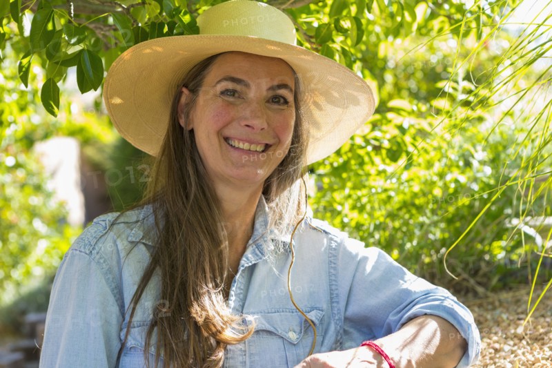 Portrait of smiling older Caucasian woman in garden
