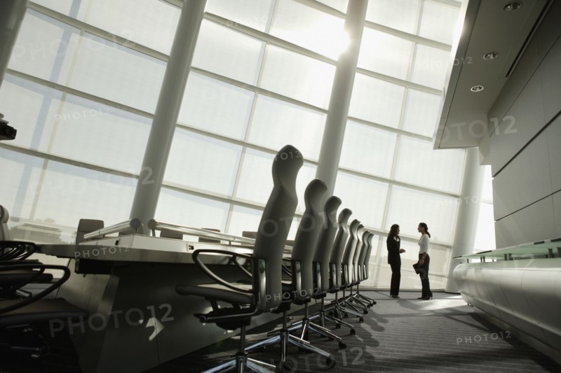 Businesswomen talking in conference room