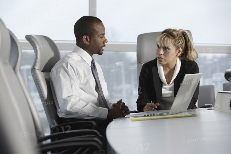 Multi-ethnic businesspeople talking