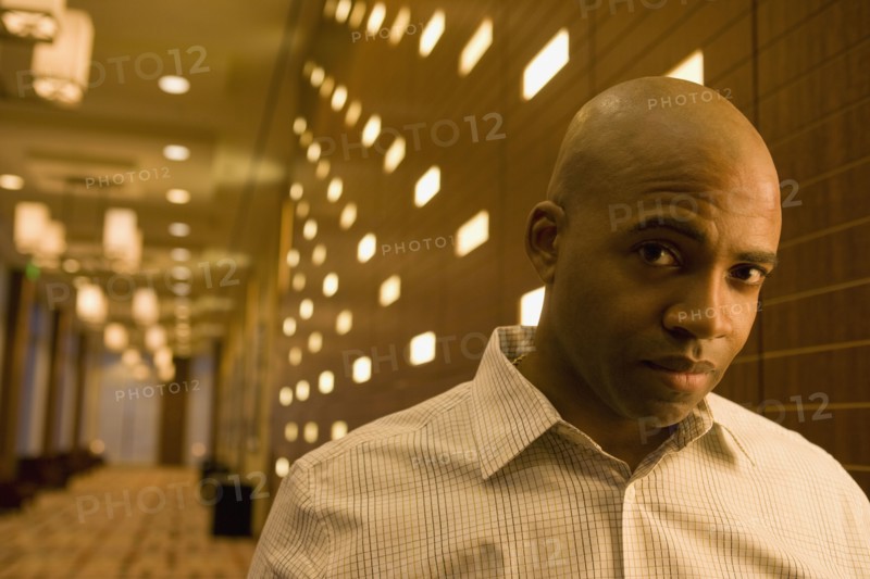 African businessman looking worried