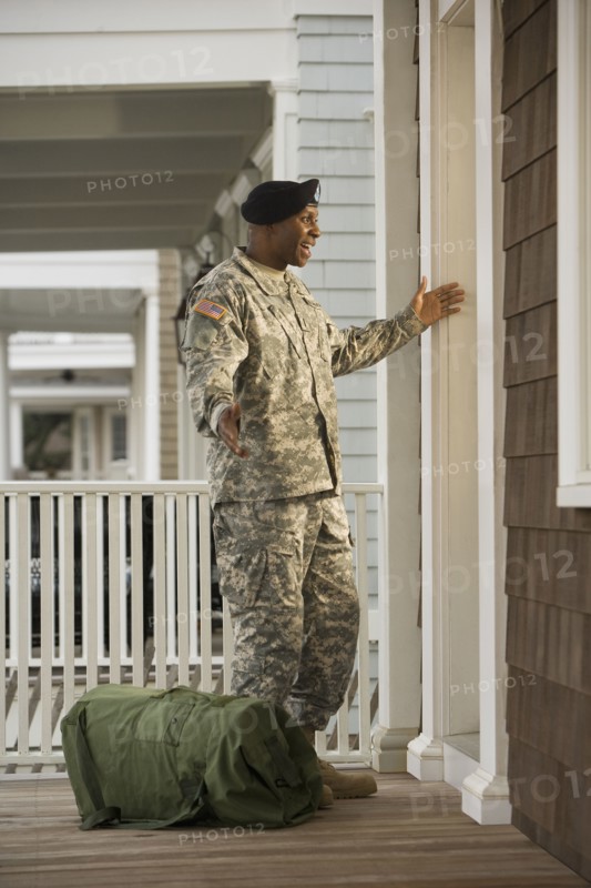 African soldier returning home