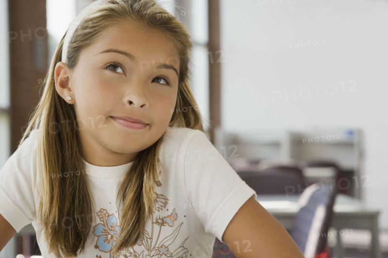 Asian girl daydreaming