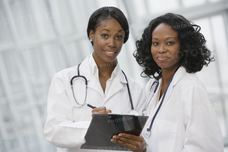 African doctors holding medical chart