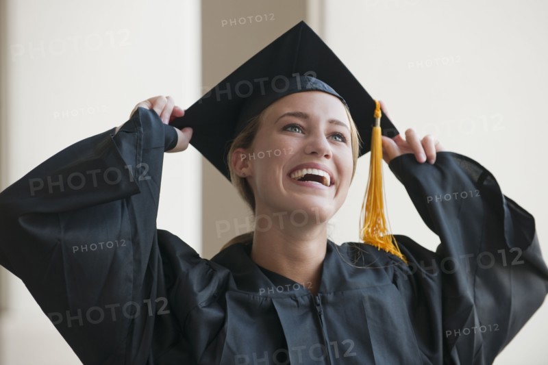 Caucasian graduate in cap and gown