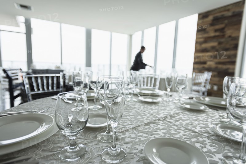 Table setting in empty restaurant