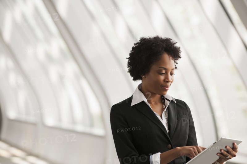 African American businesswoman using digital tablet