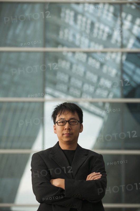 Asian businessman with arms crossed