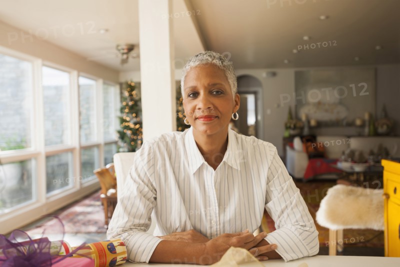 African American woman sitting at table