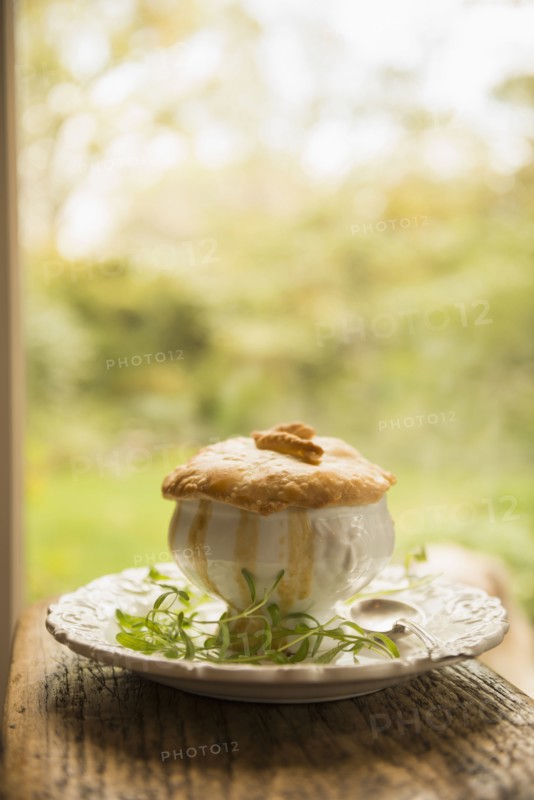 Plate of baked pie and herbs