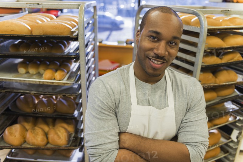 Black baker working in commercial kitchen