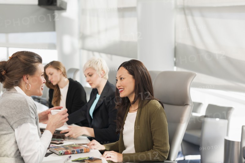 Businesswomen talking in meeting