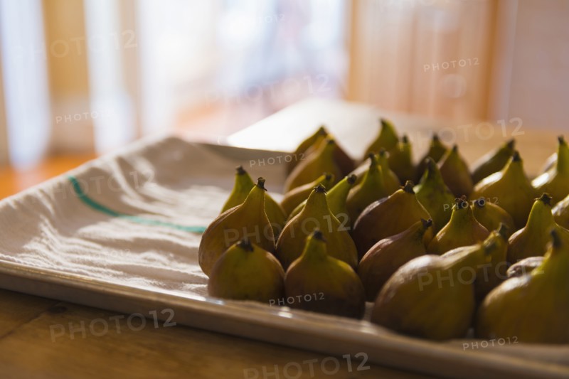 Plate of figs on towel