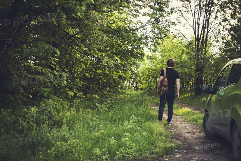 Caucasian woman walking on dirt path