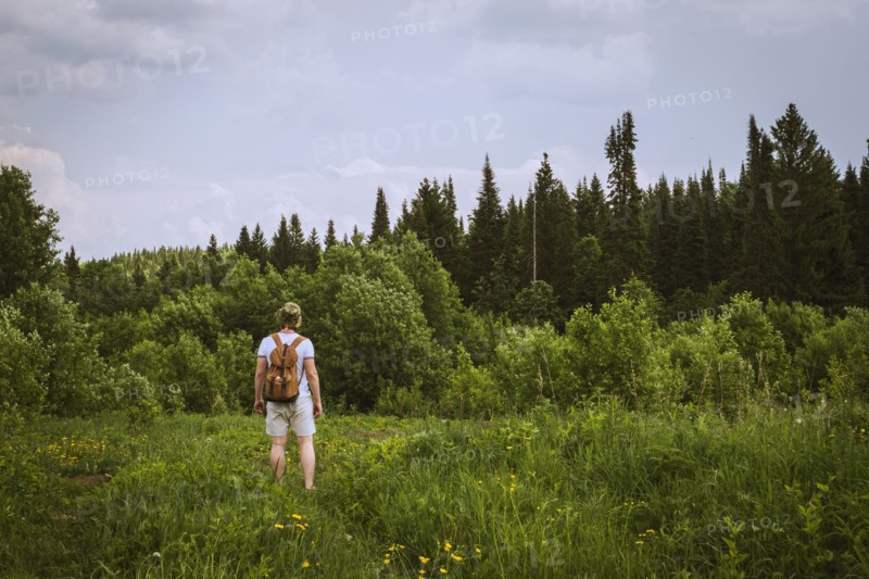 Man standing in rural field