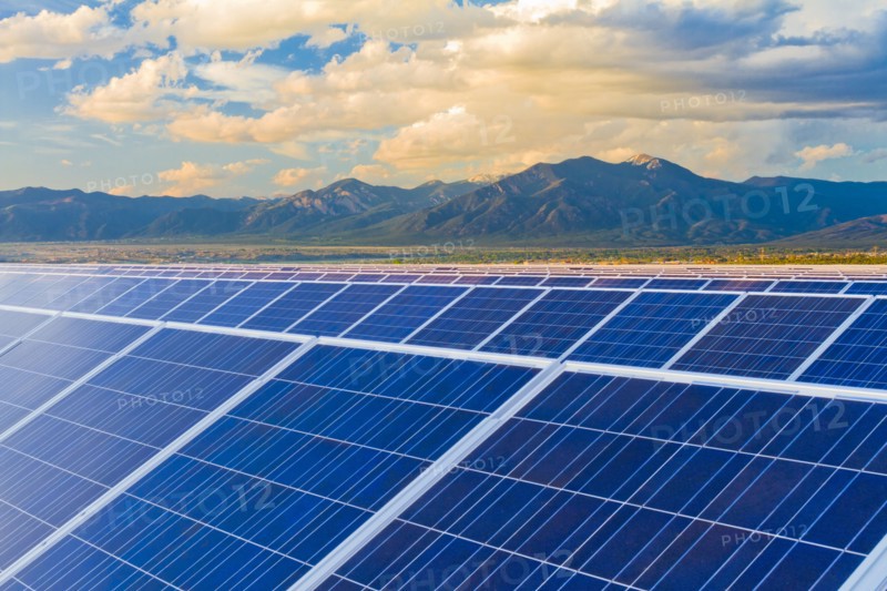 Mountains behind solar panels