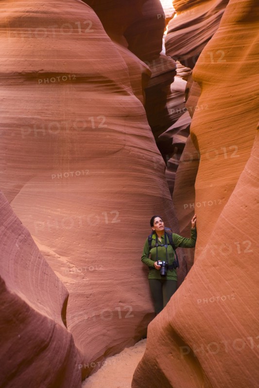 Persian woman hiking in canyon