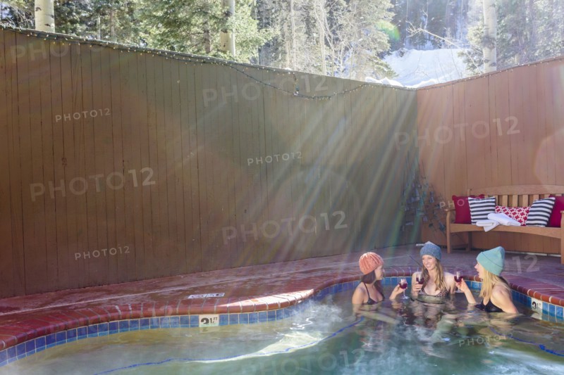 Women relaxing in hot tub