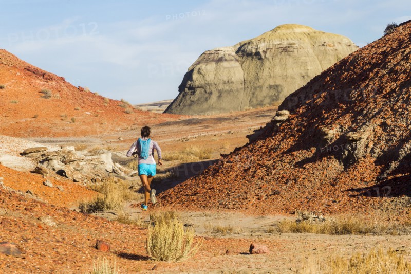 Native American woman running in desert