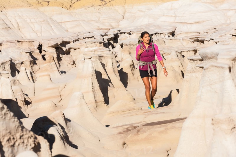Native American woman hiking in desert