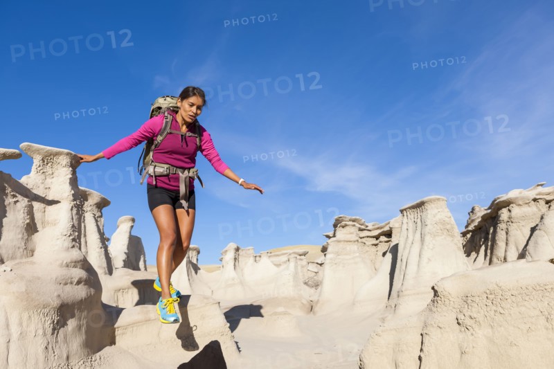 Native American woman hiking in desert