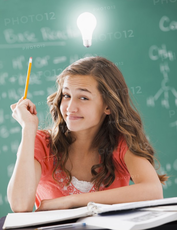 Caucasian student with light bulb over her head