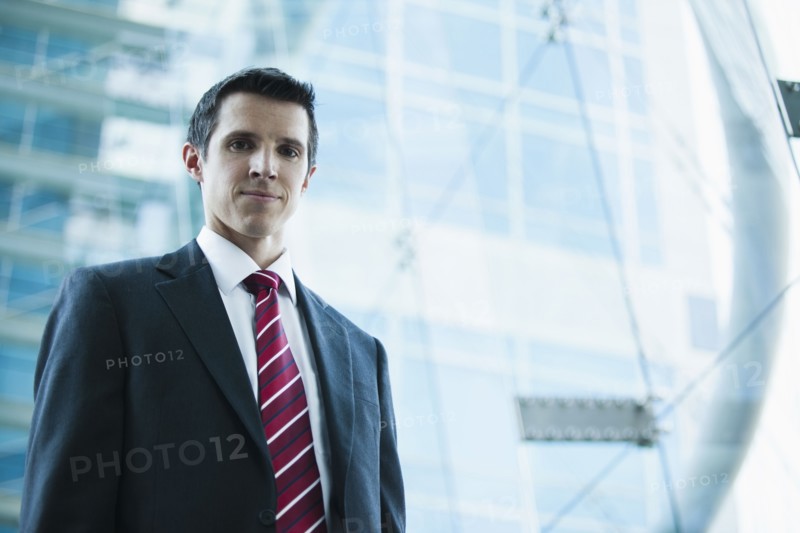 Caucasian businessman standing outdoors
