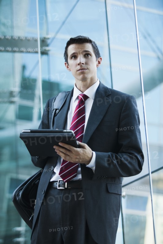 Caucasian businessman using digital tablet