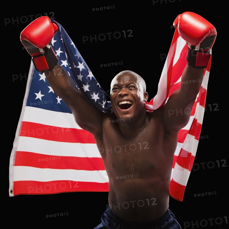 African American boxer holding American flag