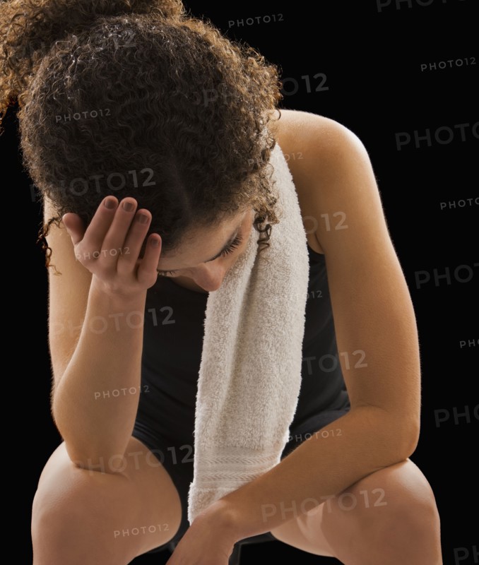 Caucasian woman tired after exercise