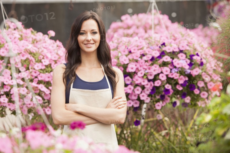 Caucasian woman working in plant nursery