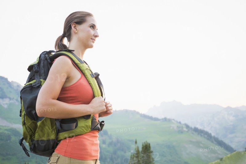 Caucasian hiker wearing backpack