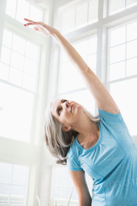 Caucasian woman practicing yoga
