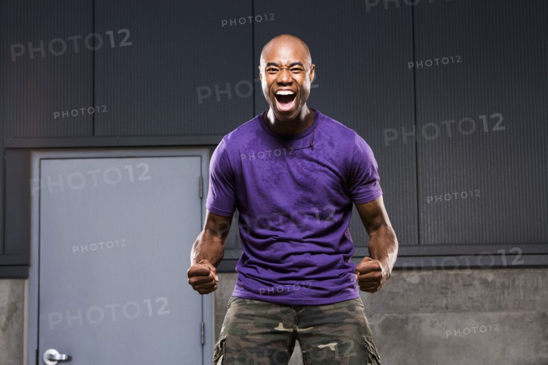 Black man cheering