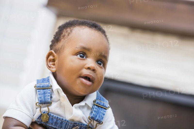 Close up of Black baby boy in living room