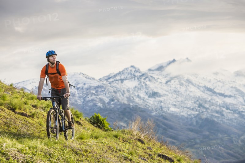Caucasian man riding mountain bike